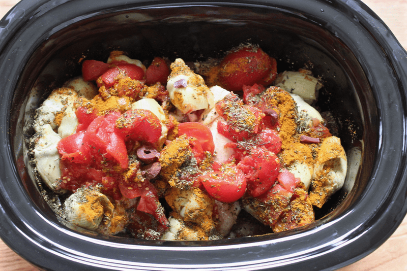 Crock pot Mediterranean chicken before cooking