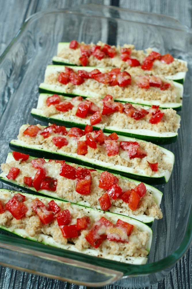 Quinoa and hummus stuffed zucchini