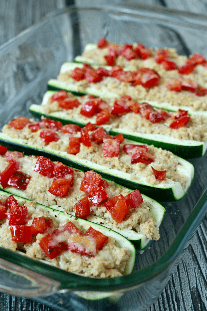 Quinoa and hummus stuffed zucchini