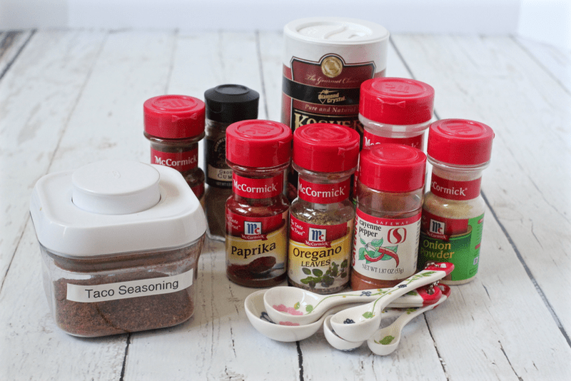 Spices set out to make homemade taco seasoning