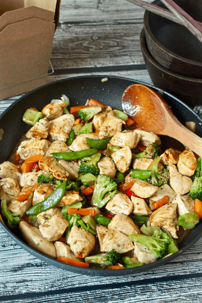 A quick and easy chicken and veggie stir fry with just a few ingredients - perfect for a busy weeknight. No more takeout needed!