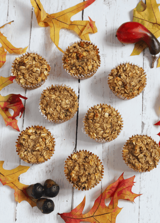 Healthy harvest zucchini muffins are made with oats, banana, applesauce and zucchini! They are gluten-free and great for breakfast, school lunch or a snack! | FamilyFoodontheTable.com