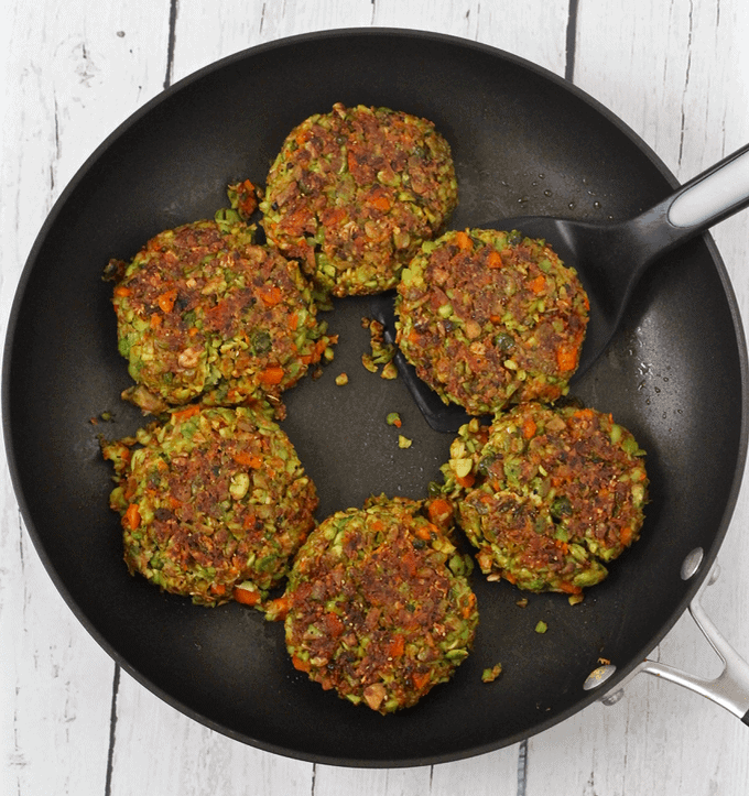 Simple veggie burgers cooking in a pan