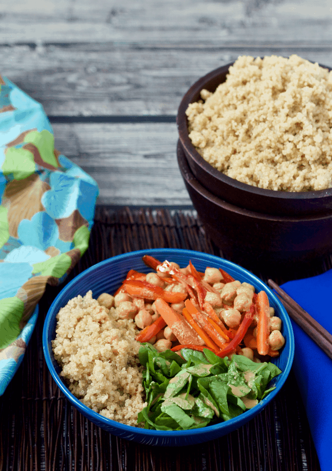 Quinoa veggie Buddha bowl with lemon-tahini dressing - a 15-minute vegetarian meal that's light but filling! | FamilyFoodontheTable.com