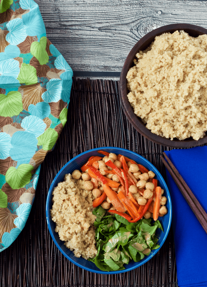 Quinoa veggie Buddha bowl with lemon-tahini dressing makes for a fast and filling vegetarian meal! | FamilyFoodontheTable.com