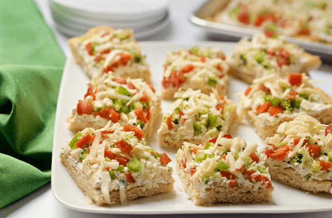 Easy vegetable squares served on a white platter