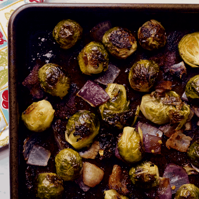 Roasted Brussels sprouts with bacon and red onion - an easy, delicious side dish! | FamilyFoodontheTable.com