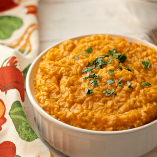 A creamy brown rice with butternut squash recipe that makes for an easy, delicious side dish! Plus, 2 variations to try | FamilyFoodontheTable.com