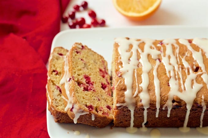 Whole wheat orange cranberry bread with an easy citrus glaze | FamilyFoodontheTable.com