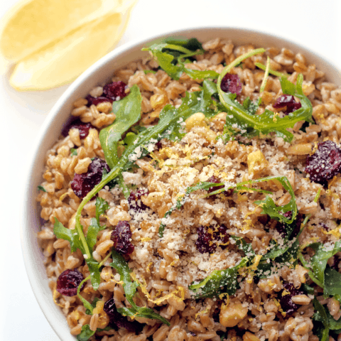 A quick and easy citrus farro salad with arugula, walnuts and dried cranberries | FamilyFoodontheTable.com