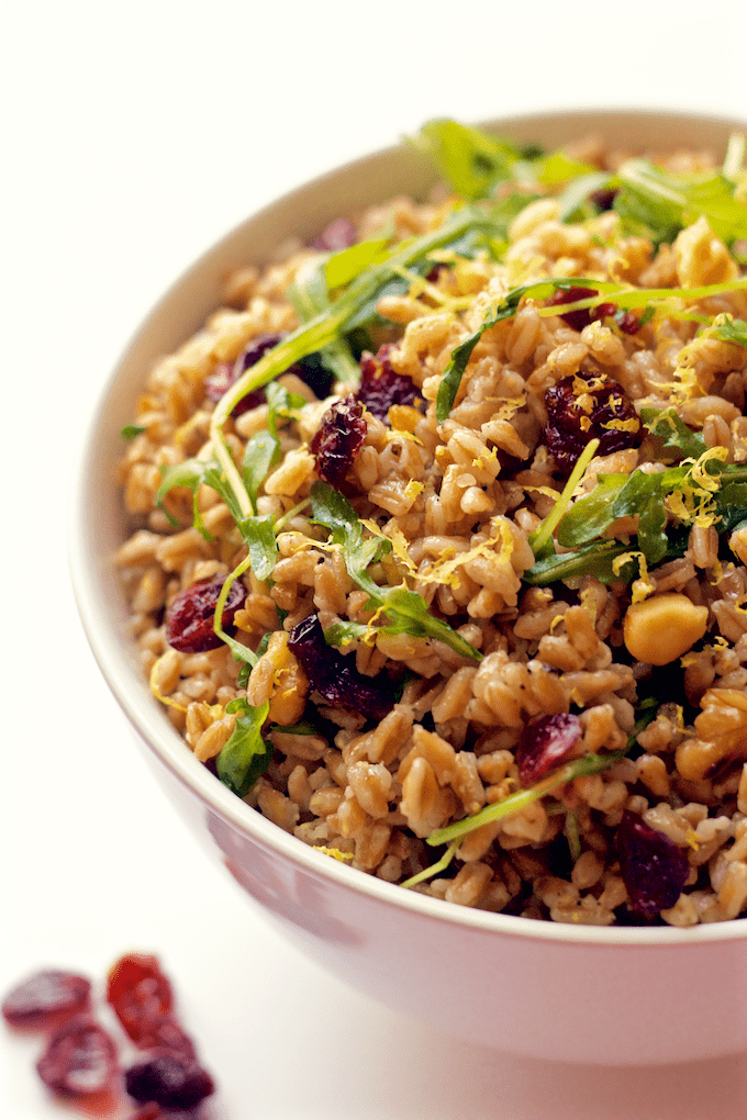 A fast and easy citrus farro salad with arugula, walnuts and dried cranberries | FamilyFoodontheTable.com