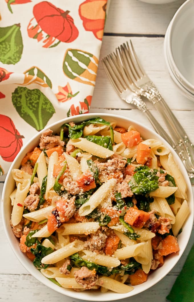 Turkey sausage, butternut squash and spinach gluten-free pasta - an all-in-one dinner with big flavor that everyone can enjoy! | FamilyFoodontheTable.com