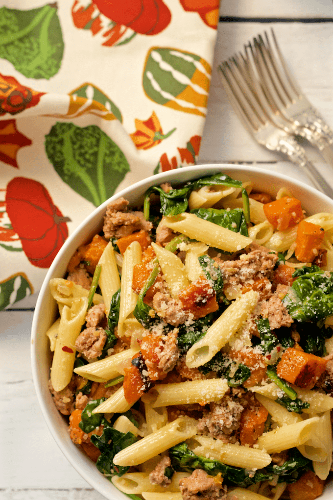 A gluten-free pasta dinner with turkey sausage, roasted butternut squash and spinach | FamilyFoodontheTable.com