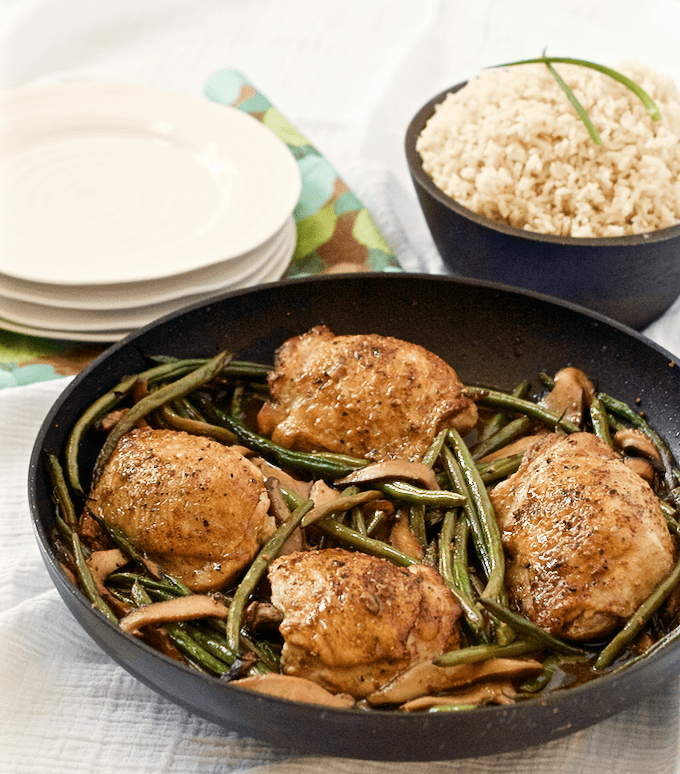 A one-skillet, 30-minute dinner of browned chicken thighs with shiitake mushrooms and French green beans | FamilyFoodontheTable.com