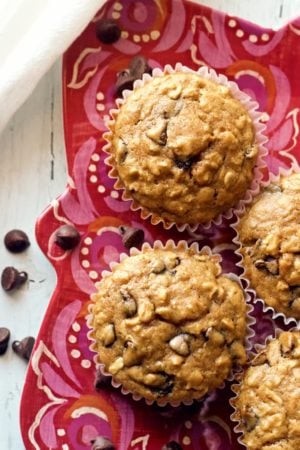 Healthy chocolate chip muffins -- made with wheat flour, oats and just a tiny bit of butter for a fun breakfast or easy afternoon snack! | FamilyFoodontheTable.com