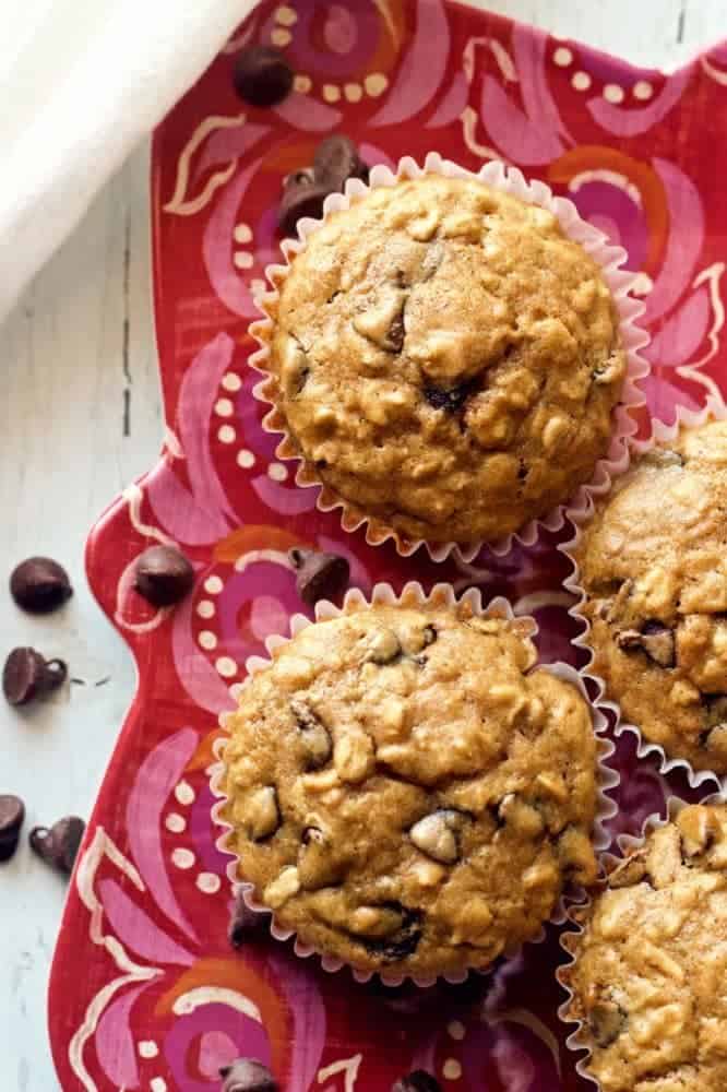 Healthy chocolate chip muffins are made with wheat flour, oats and just a tiny bit of butter for a fun breakfast or easy afternoon snack! #chocolatelover #muffins #healthysnack