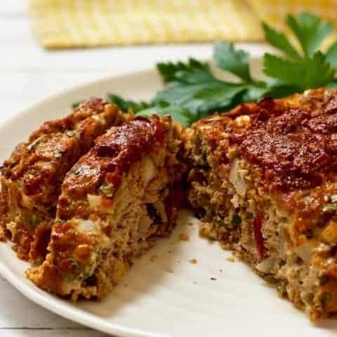 An easy, 1-bowl healthy Mexican ground turkey meatloaf with cheese, chilies and salsa! | FamilyFoodontheTable.com