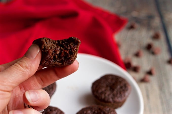 Healthy double chocolate mini cupcake with a bite taken out