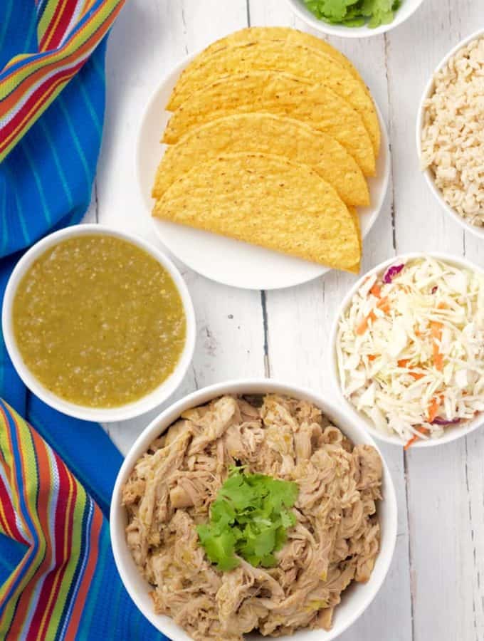 Slow cooker salsa verde shredded pork - great for tacos, rice bowls, quesadilla and nachos! | FamilyFoodontheTable.com