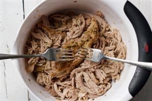 Shredded cooked pork in a bowl