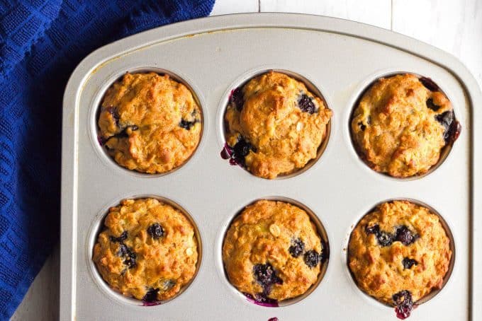 Baked muffins with blueberries in a muffin tin