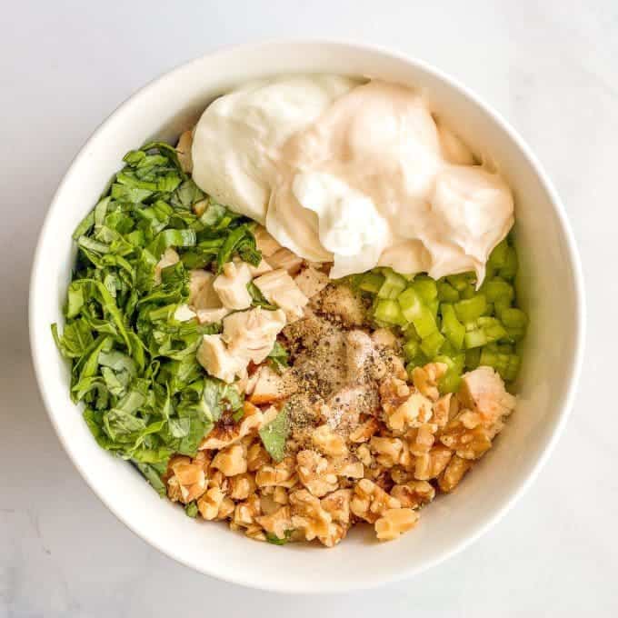 Healthy basil chicken salad with walnuts - an easy, creamy, delicious lunch! Serve as a sandwich, wrap, salad or with crackers! | www.familyfoodonthetable.com