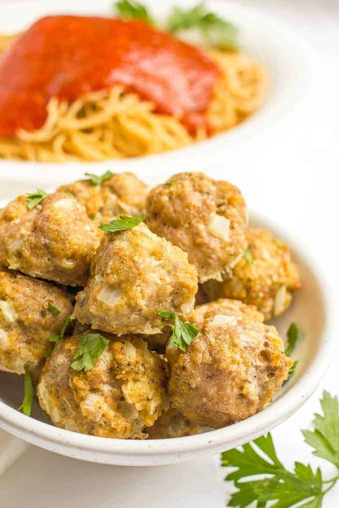 Homemade baked turkey meatballs are perfect for a spaghetti dinner, feeding a crowd or freezing to have on hand for busy nights. And this easy recipe takes just minutes to prep! | www.familyfoodonthetable.com