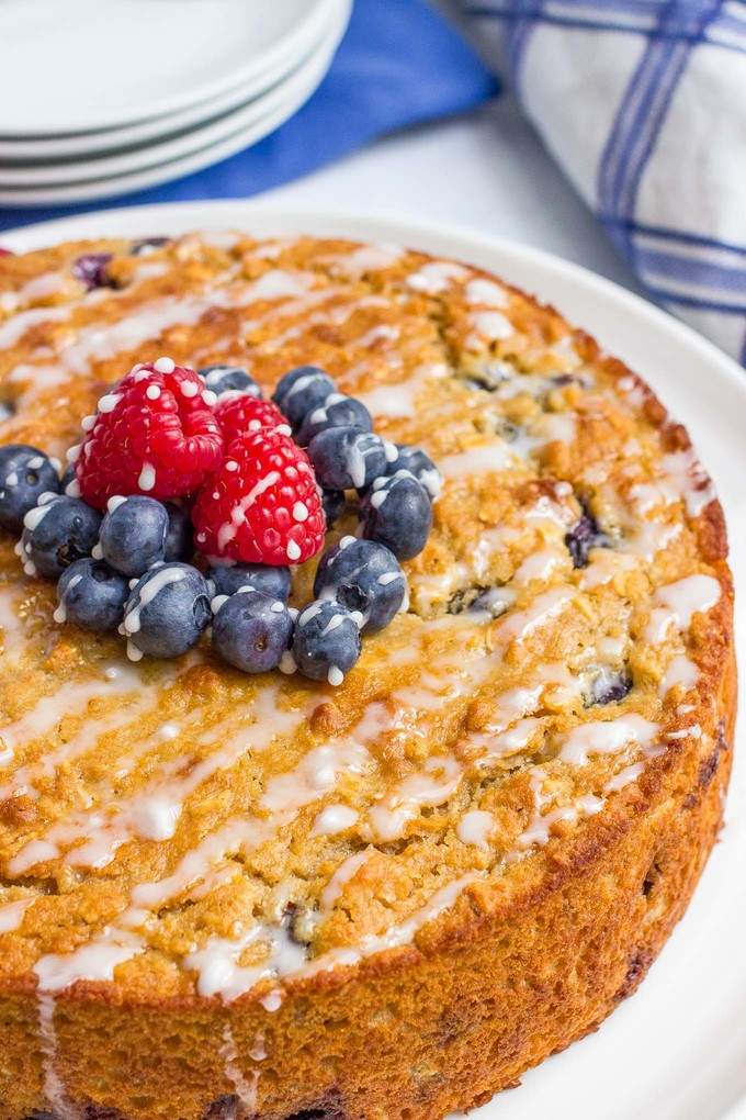 Blueberry cake with an easy lemon glaze - a healthy whole grain dessert with no butter or oil for a great, light summer treat!