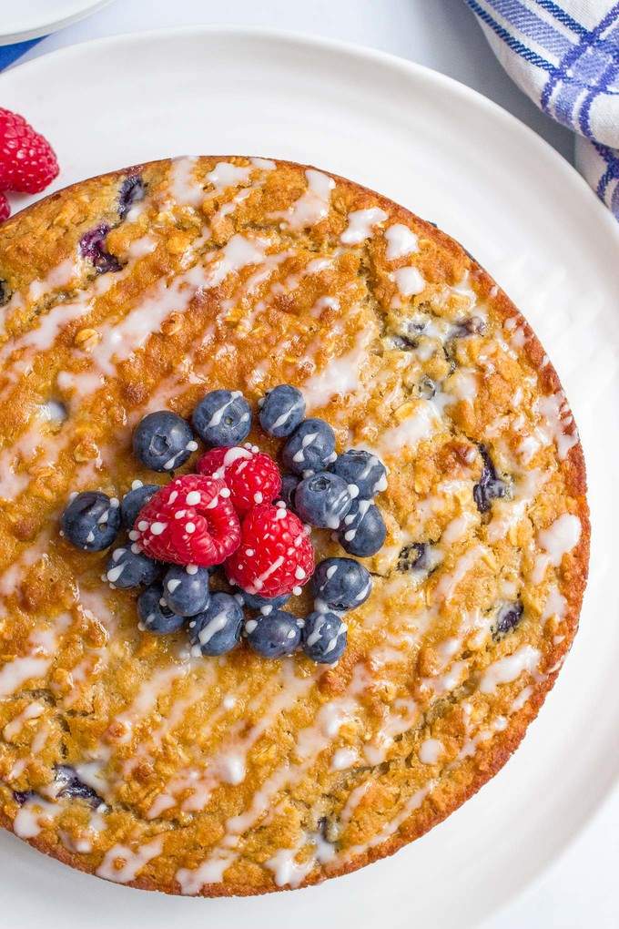 Blueberry cake with an easy lemon glaze - a healthy whole grain dessert with no butter or oil for a great, light summer treat!