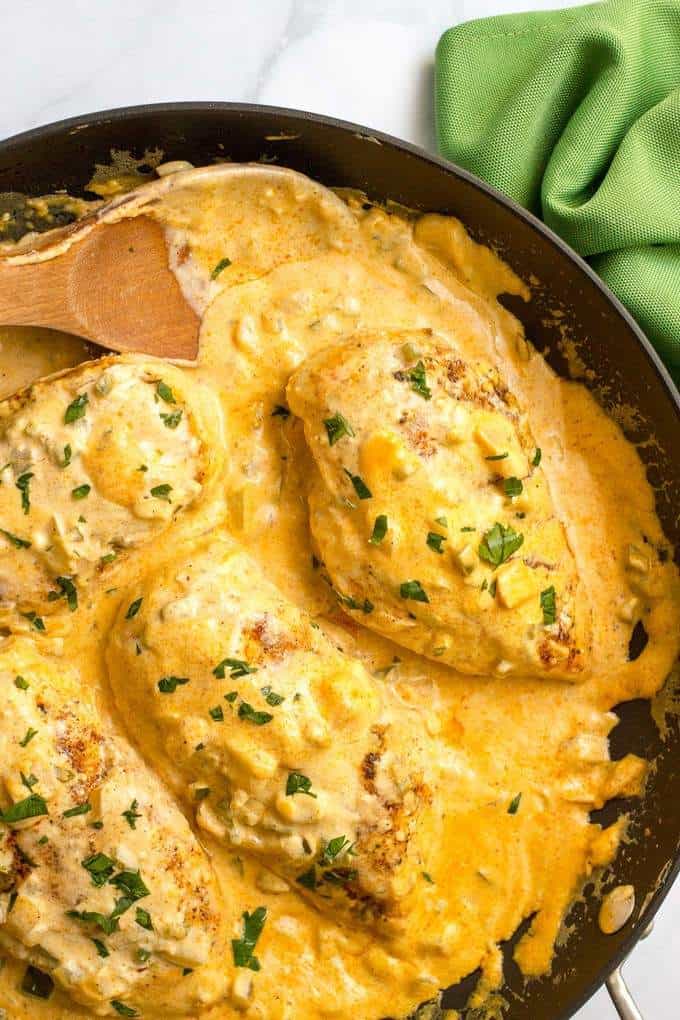 Chicken jalapeno - an easy one-pot dinner with chicken breasts and a jalapeno cheddar cheese sauce | FamilyFoodontheTable.com