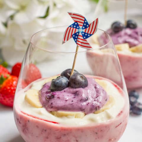 Healthy yogurt parfaits with a red, white and blue layer for a fun and festive July 4th breakfast or snack!