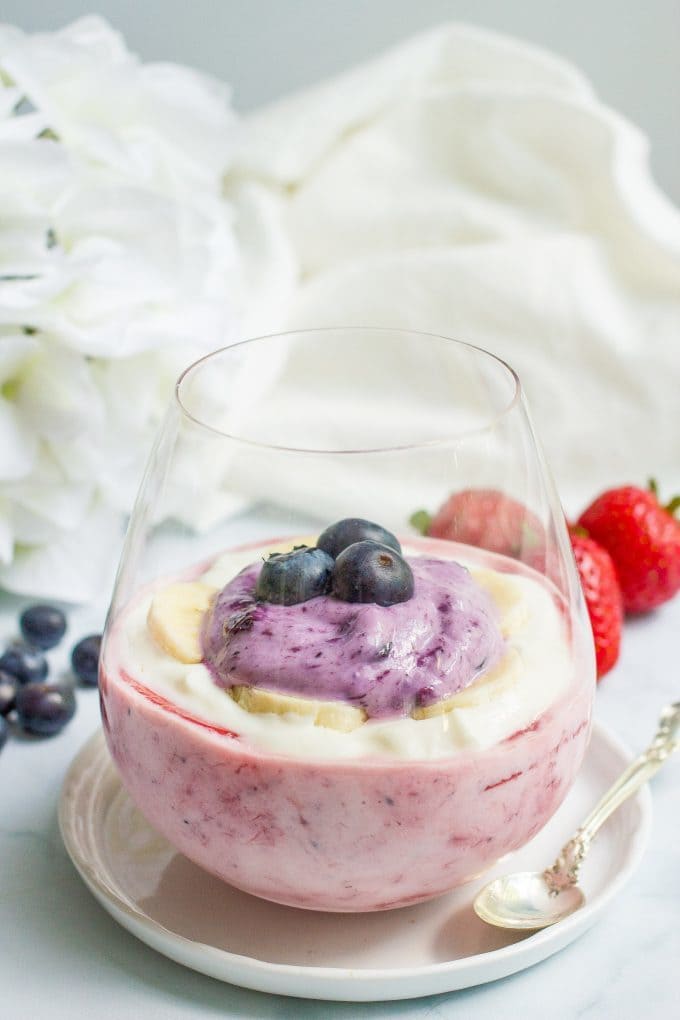 Healthy yogurt parfaits with an all natural strawberry, honey-banana and blueberry layer - just gorgeous!