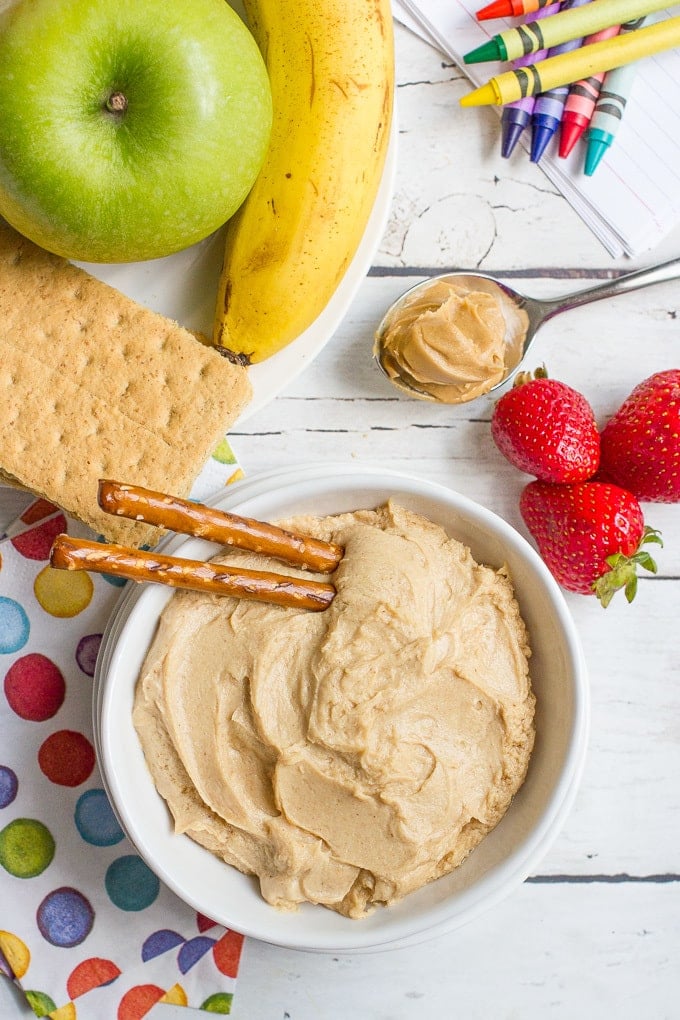 Creamy peanut butter yogurt dip - 5 ingredients and 5 minutes for this healthy kids snack. Serve with fresh fruit, graham crackers or pretzels