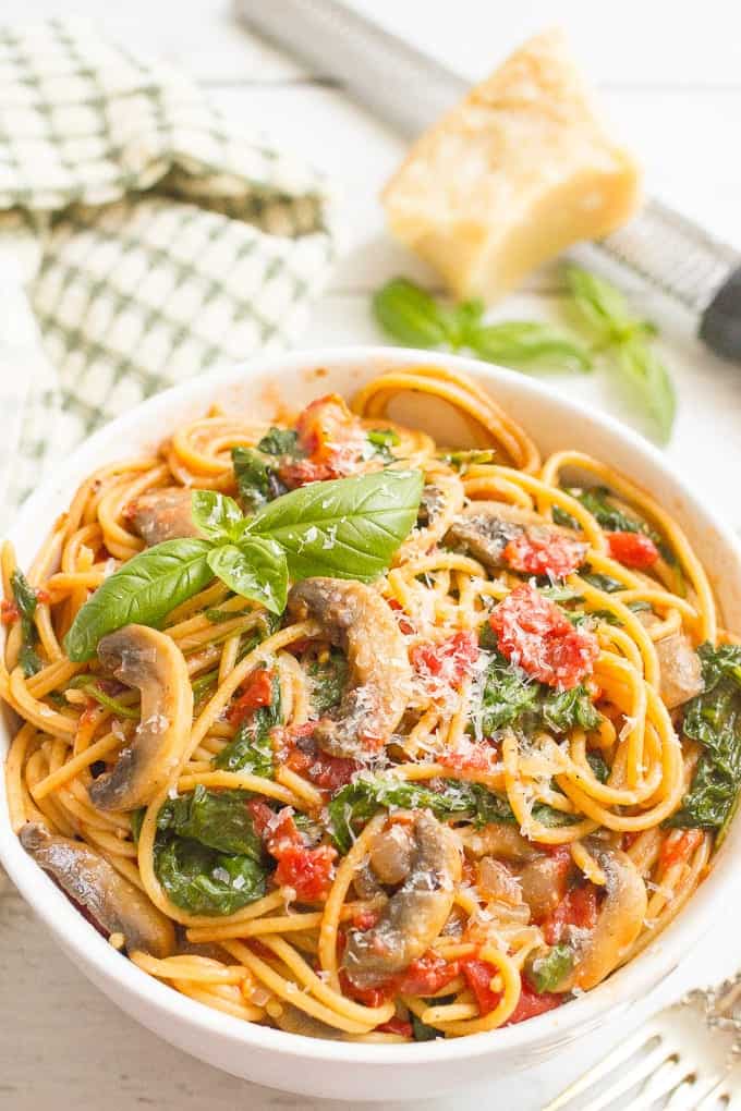 Vegetarian spaghetti with mushrooms and spinach makes an easy, healthy one pot pasta dinner that’s ready in 25 minutes!