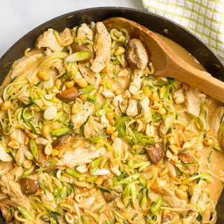 Easy chicken satay with zucchini noodles, mushrooms and an addictive peanut sauce - in a one-pot 30-minute healthy dinner!