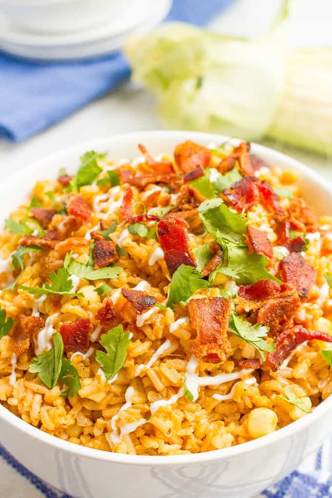 Bacon rice with corn is a one-pot summer side dish favorite that can be enjoyed year-round. Add your favorite toppings and dig in!