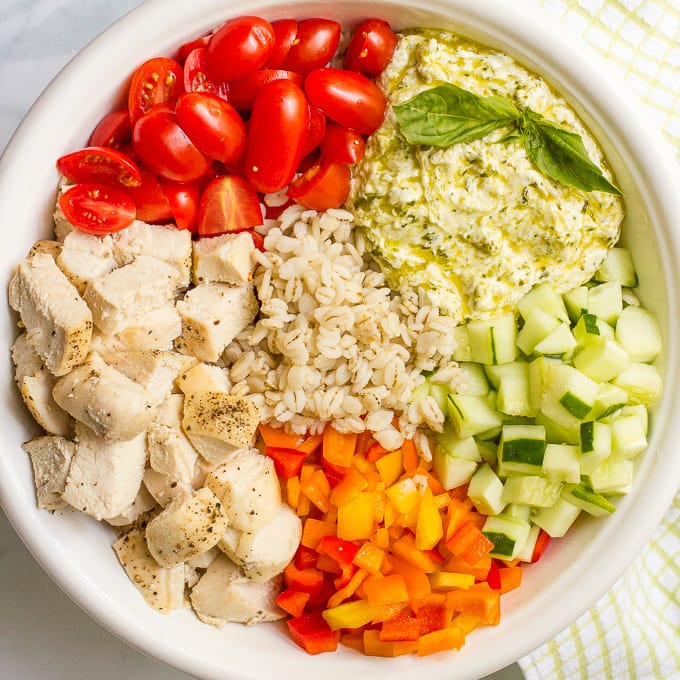 Chicken and barley salad with a creamy pesto-yogurt mixture — a great recipe for a fresh and healthy lunch or dinner! | familyfoodonthetable.com