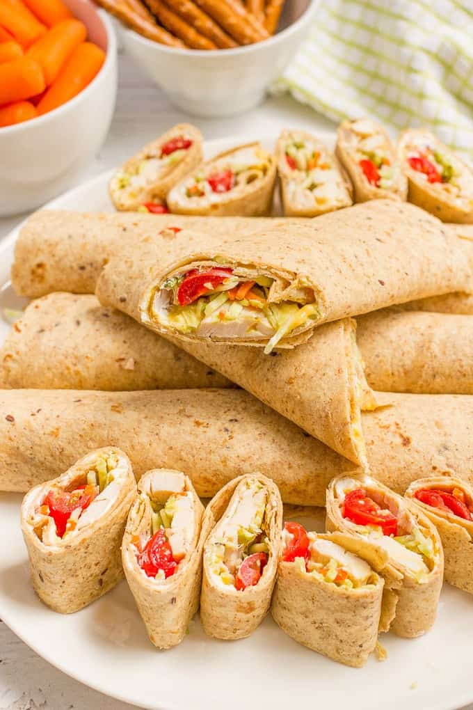 Easy chicken roll ups with cream cheese and veggies - great for lunch, appetizers or tailgating