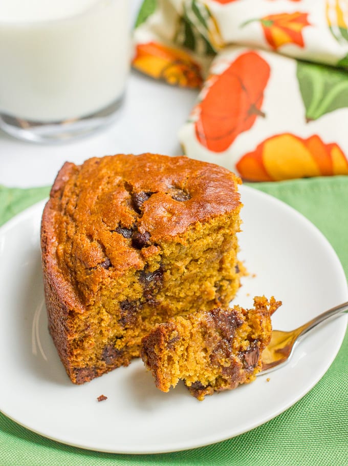 A slightly healthier banana pumpkin chocolate chip cake recipe with rich chocolate flavor and tall thick slices - a delicious fall dessert!