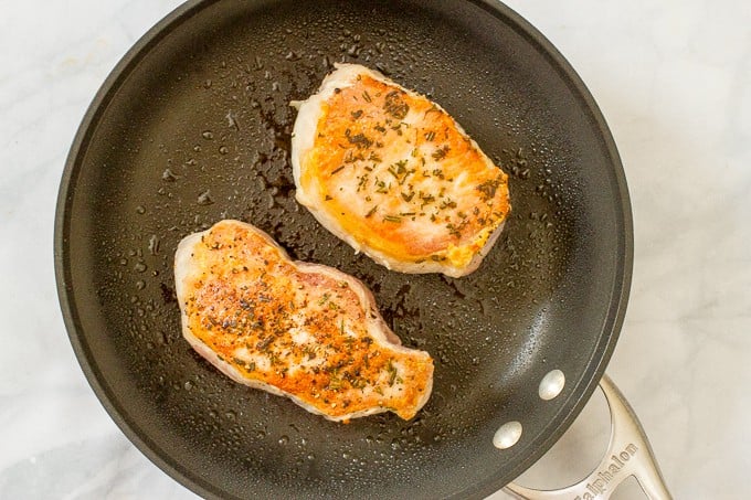 Cranberry balsamic pork chops -- a quick and easy weeknight or date night dinner!