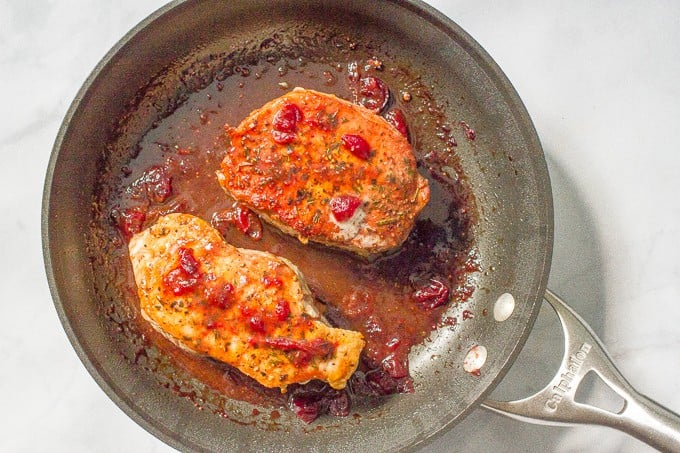 Cranberry balsamic pork chops -- a quick and easy weeknight or date night dinner!