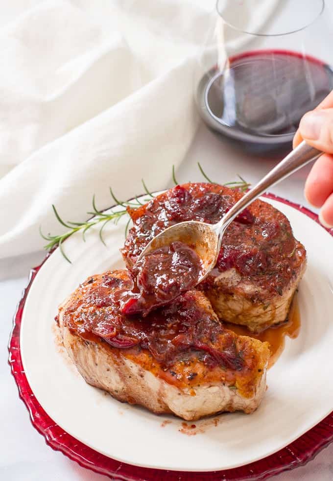 Cranberry balsamic pork chops are a quick and easy weeknight or date night dinner that has serious flavor with simple ingredients | www.familyfoodonthetable.com