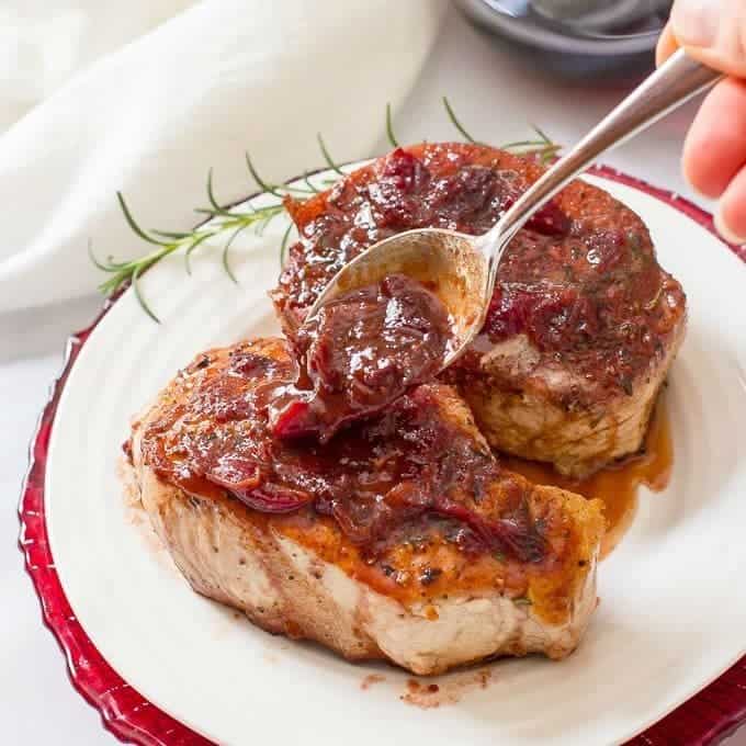 Cranberry balsamic pork chops are a quick and easy weeknight or date night dinner that has serious flavor with simple ingredients