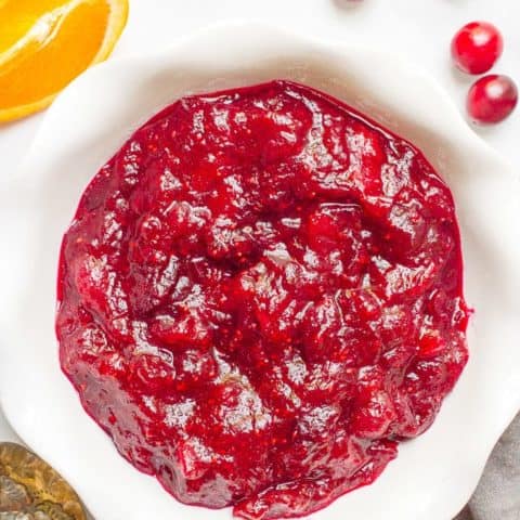 Easy cranberry sauce -- just 15 minutes and 4 ingredients for this homemade cranberry sauce with orange zest and honey that give it a great depth of flavor! | www.familyfoodonthetable.com