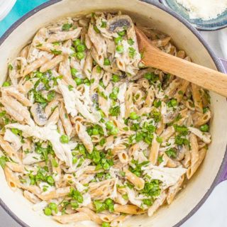 One-pot creamy chicken and mushroom pasta with peas is an easy, complete dinner that’s ready in about 30 minutes!
