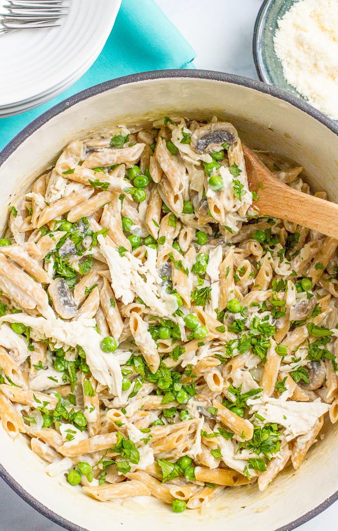 One-pot creamy chicken and mushroom pasta with peas is an easy, complete dinner that’s ready in about 30 minutes!