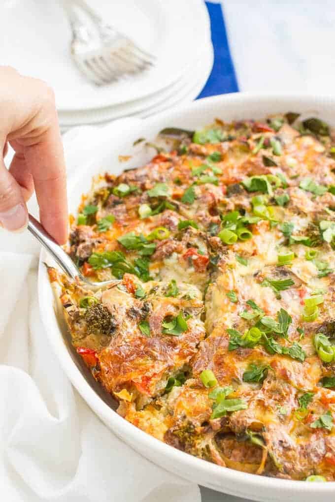 Make-ahead healthy turkey sausage breakfast casserole is an easy, veggie-packed, lightened up version of your favorite breakfast casserole! Great for Christmas morning! #breakfastcasserole #Christmasbreakfast #Christmasbrunch #brunchrecipes