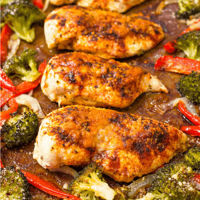 Parmesan sheet pan chicken and broccoli with bell peppers makes for an easy, hands-off healthy dinner! Gluten free and low-carb | www.familyfoodonthetable.com