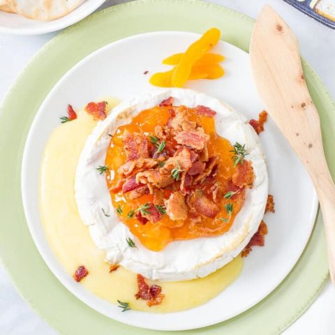 Microwave baked brie with apricots, thyme and bacon -- a quick and easy appetizer! | www.familyfoodonthetable.com