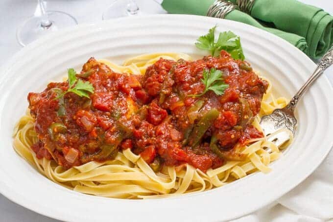 Saucy Italian slow cooker pork chops - an easy, flavorful dinner that's great for date night! | www.familyfoodonthetable.com